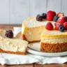 Delicious homemade cottage cheese cheesecake with fresh berries on top, showing a smooth creamy filling and golden graham cracker crust, perfect for a guilt-free dessert