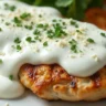 Creamy cottage cheese sauce served over grilled chicken with fresh herbs, Parmesan, and steamed vegetables.