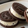 Close-up of homemade Oreo Ice Cream Sandwiches on a white plate
