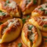 Ultra-realistic close-up of Creamy Spicy Unstuffed Shells with Fluffy Ricotta served in a white ceramic dish, showcasing rich textures and vibrant colors