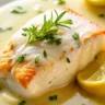Delicious Baked Cod in Coconut Lemon Cream Sauce served with a creamy coconut and lemon sauce for a perfect seafood dinner