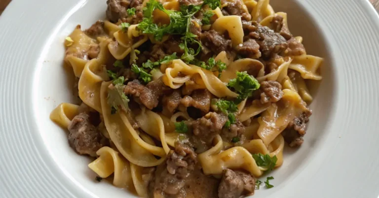 Close-up top-down view of Hamburger Stroganoff Skillet served on a white plate