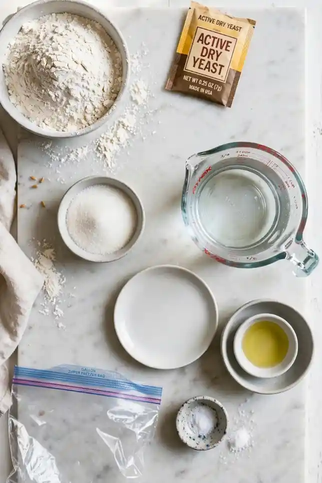 Flour, yeast, sugar, warm water, oil, salt and zip-top bag for Bread in a Bag